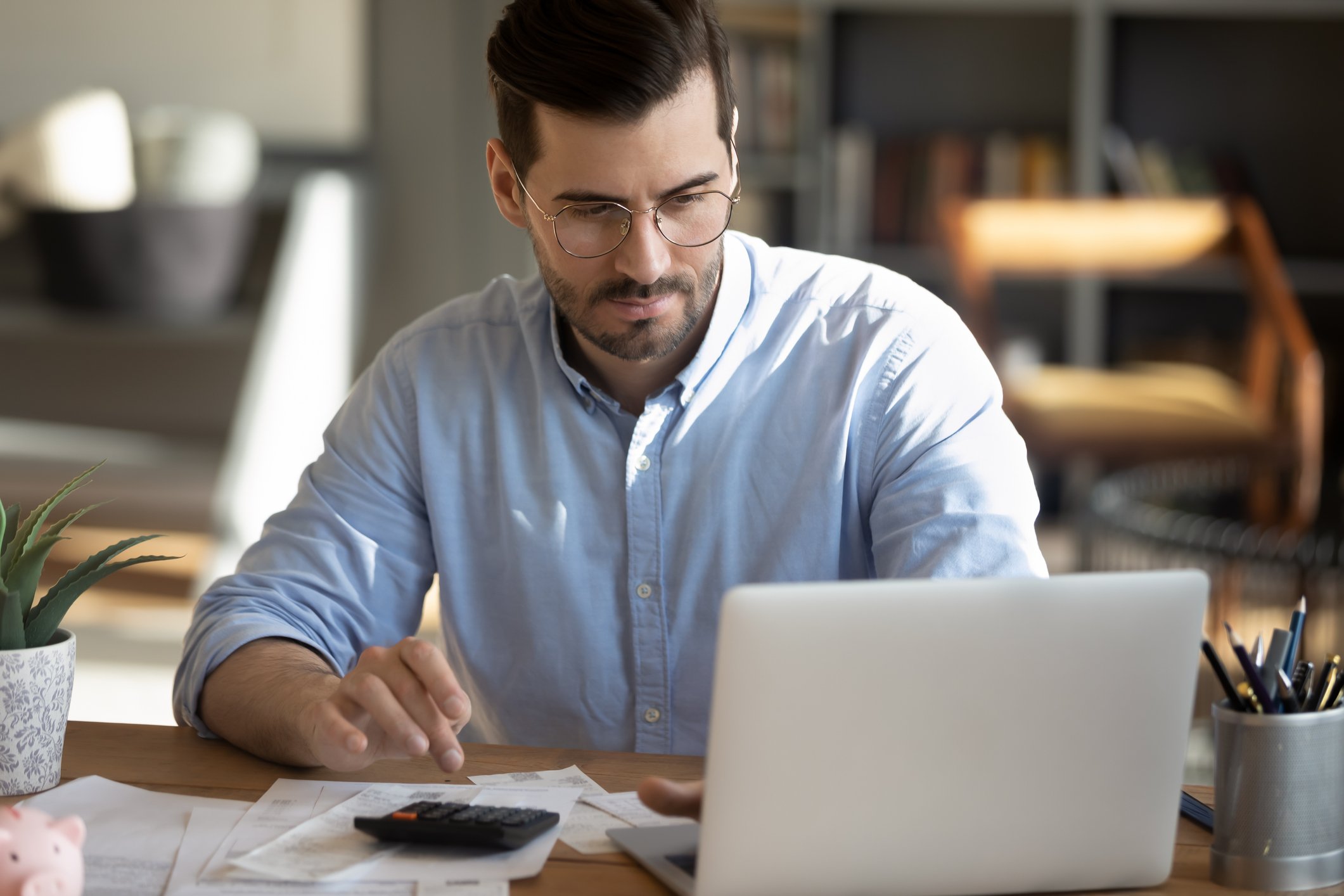 Person doing research on a laptop.