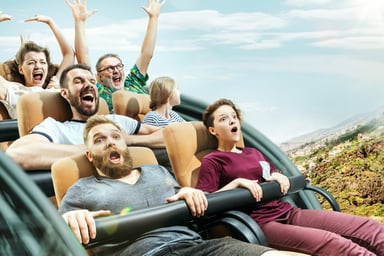 Group riding a roller coaster