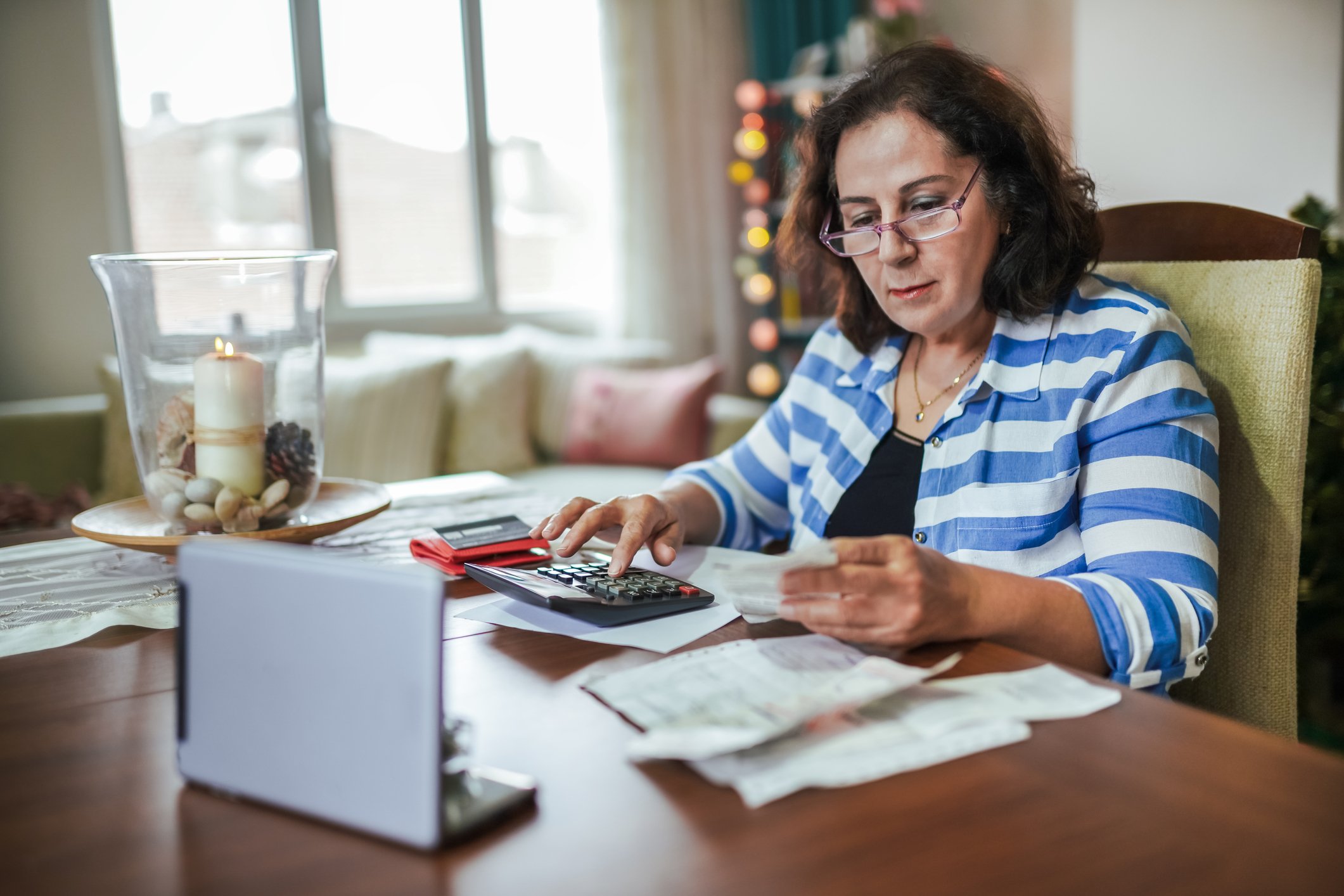A person at their desk, looking at data.