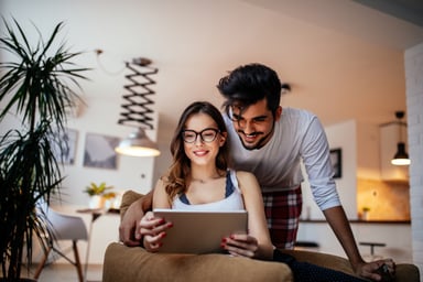 happy couple online investing stocks