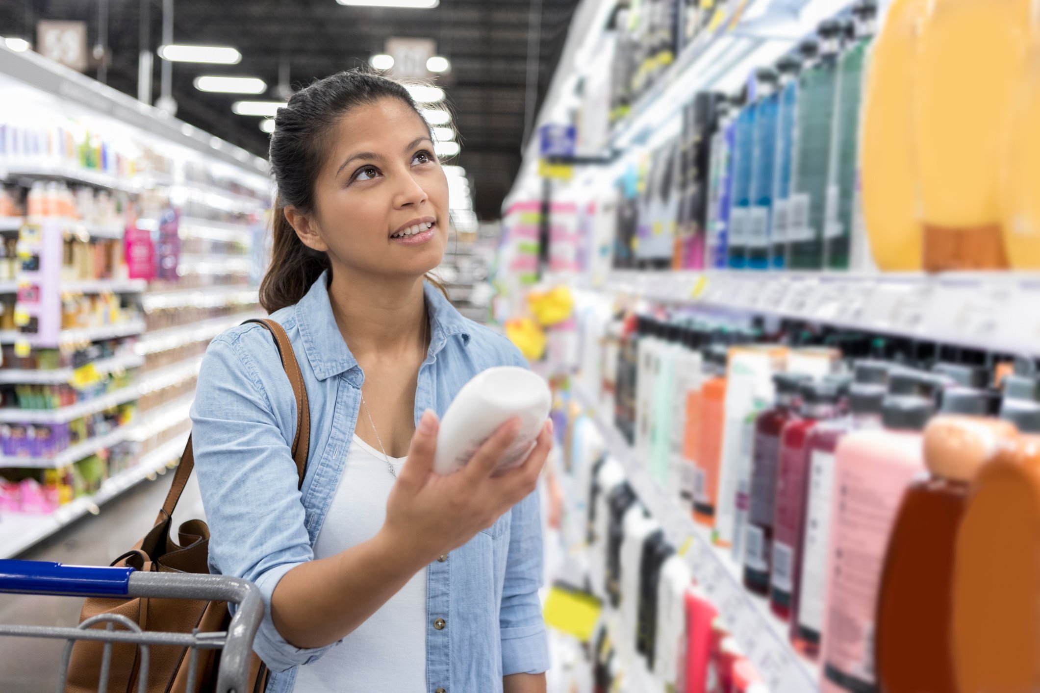 Woman Shopping for Toiletries at Supermarket