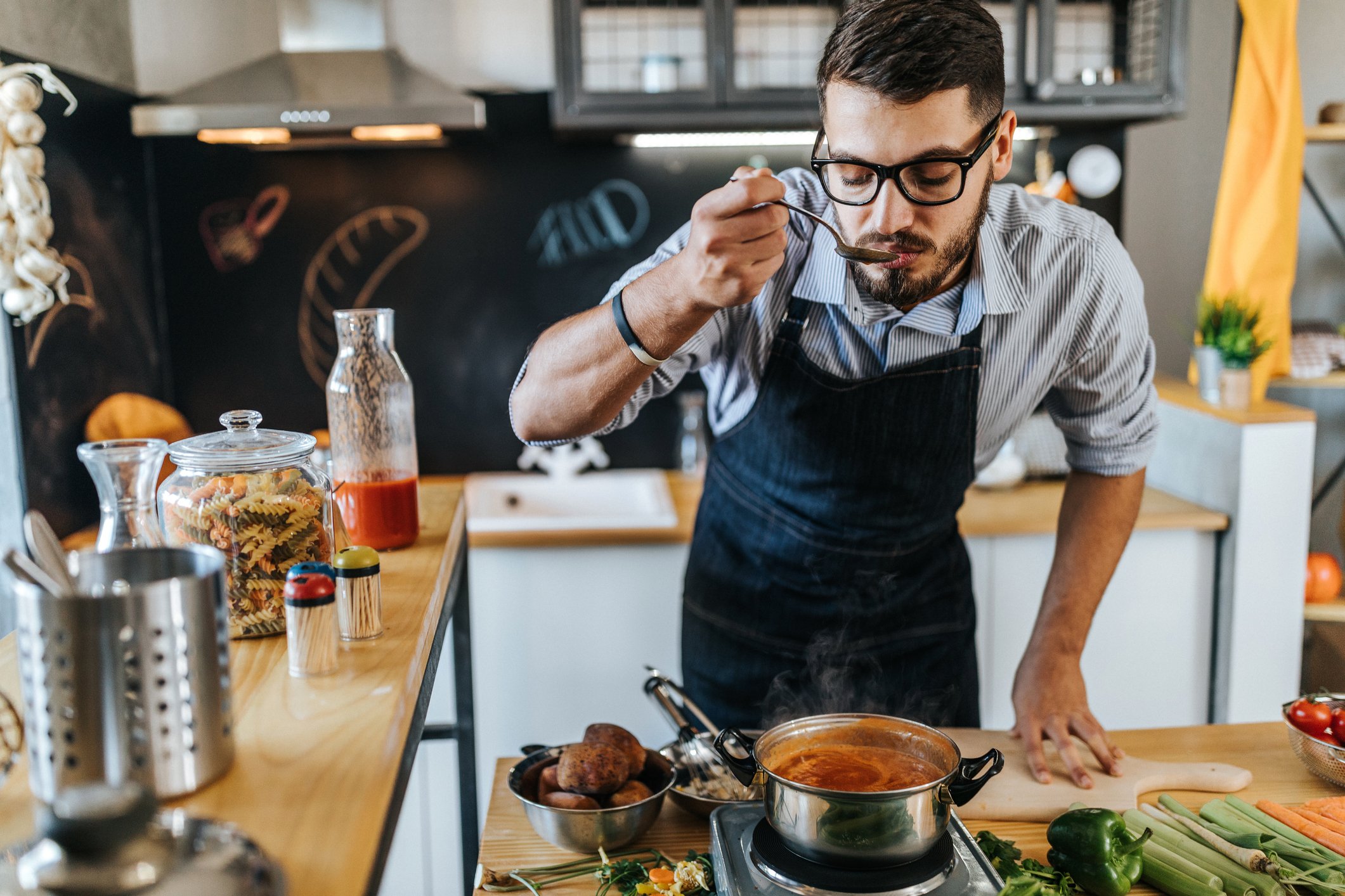 man cooking at home