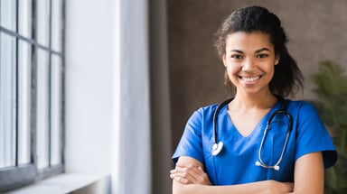 Medical professional smiling.