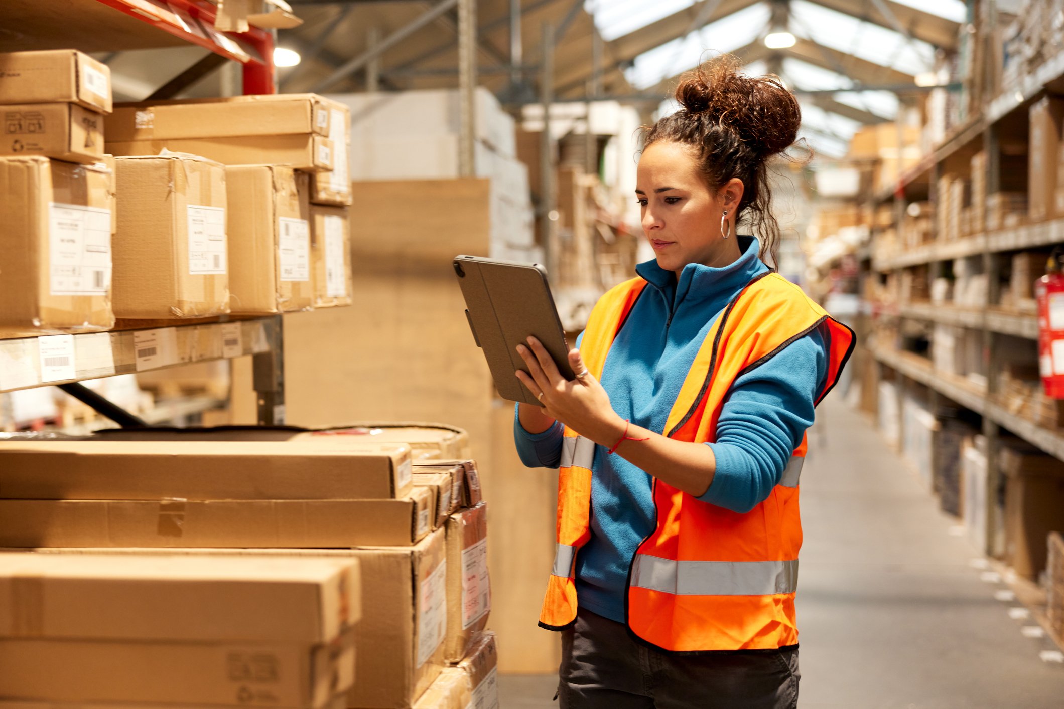 Warehouse employee with tablet