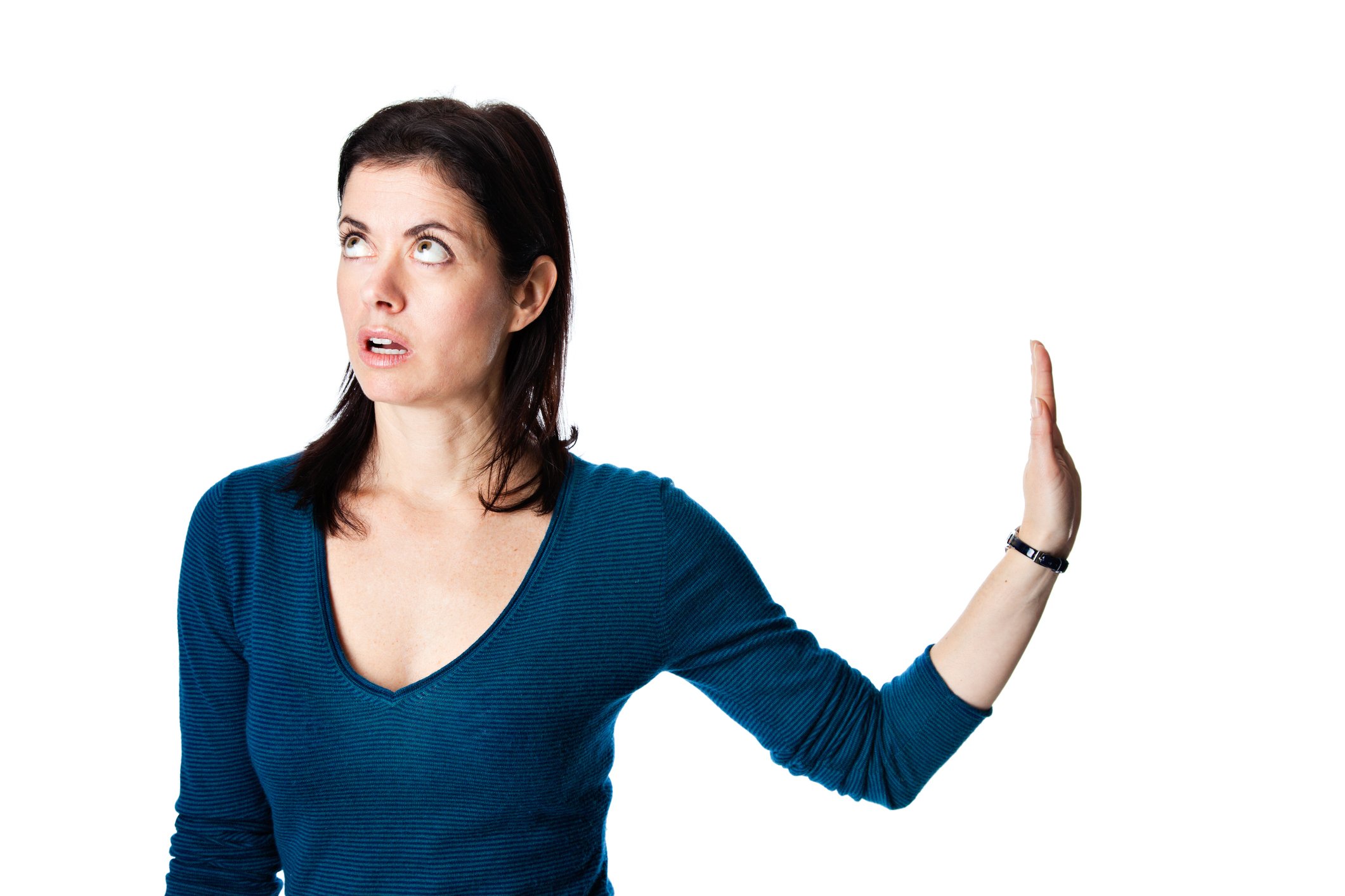 person holds up hand with exasperated expression