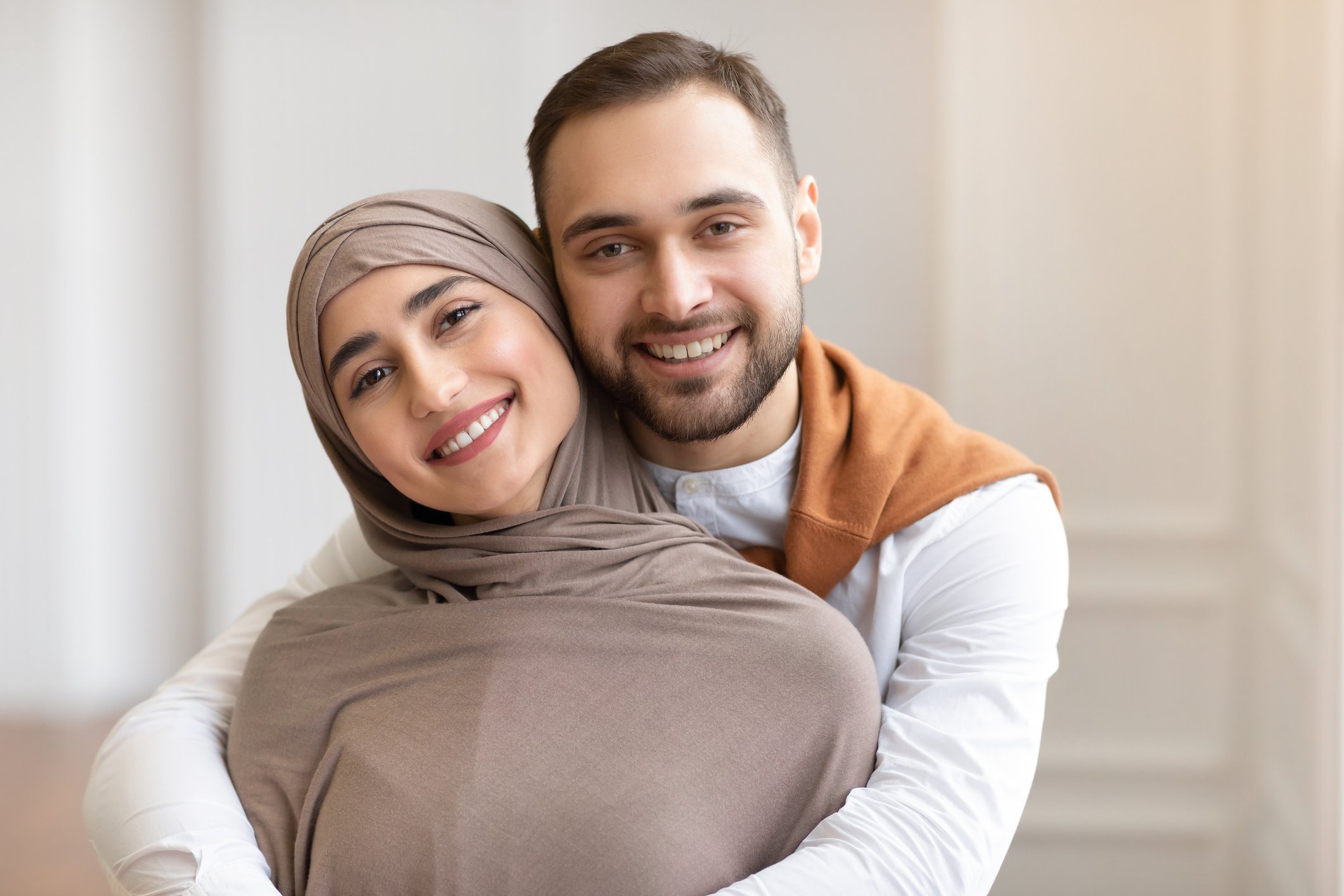 Getty - couple smiling embracing