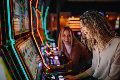 People playing slot machines at a casino