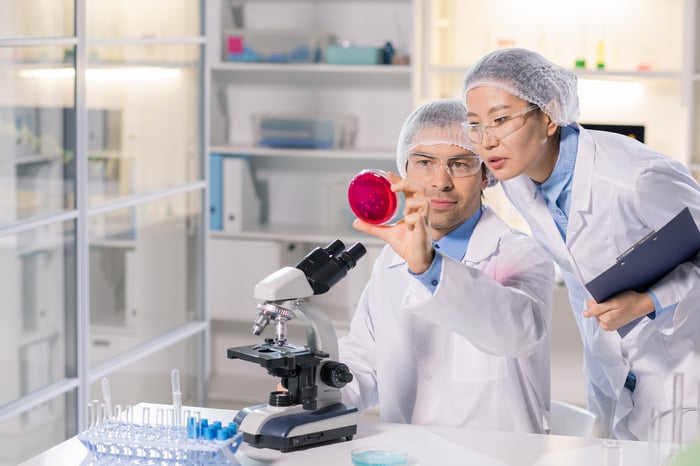 biotech engineers studying samples in a lab environment