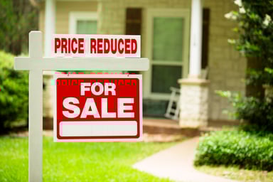 price reduction for sale home sign
