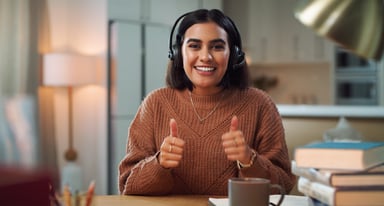 Headphones and two thumbs up