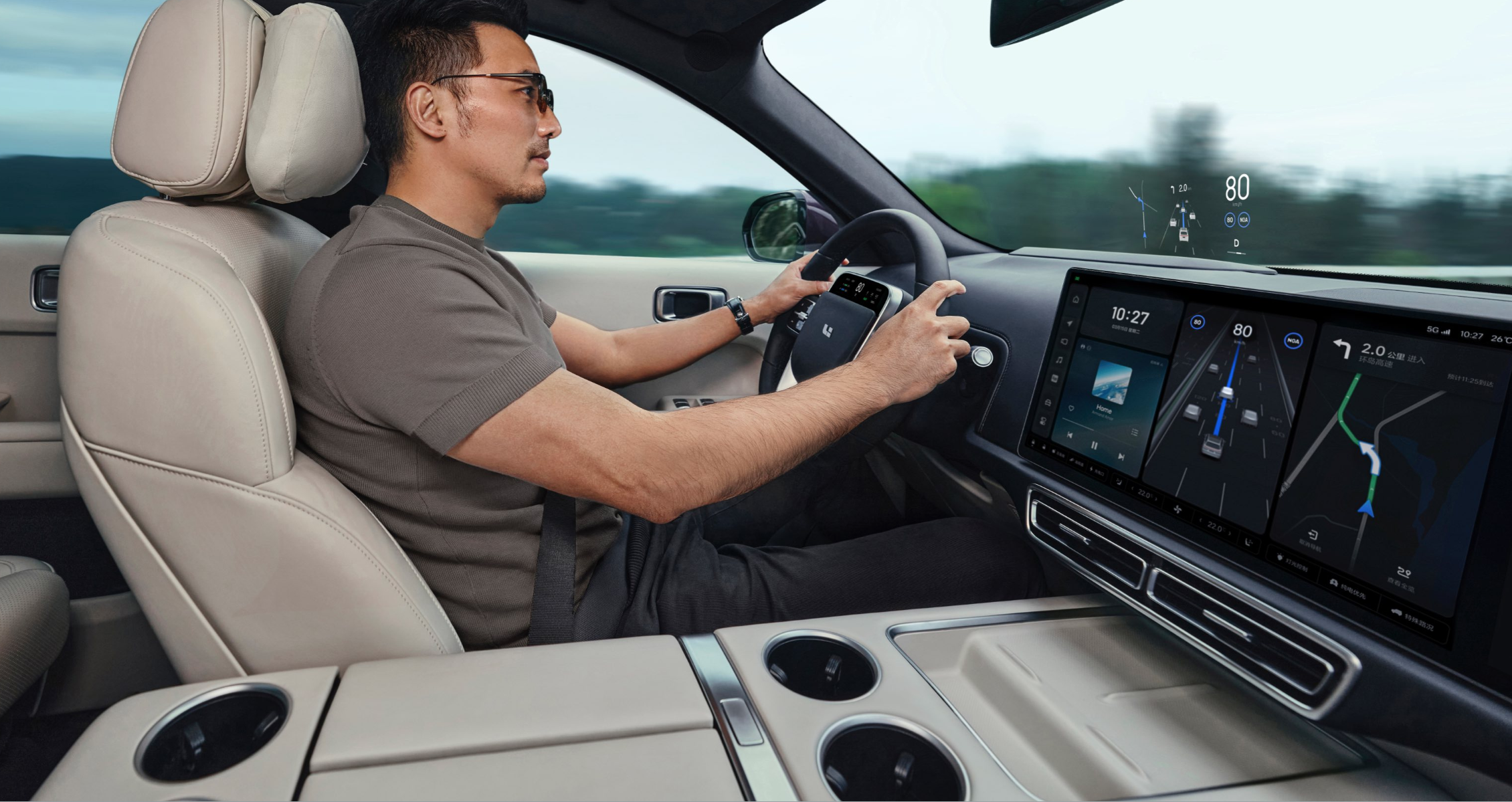 Interior view of customer driving Li Auto L9 SUV. 