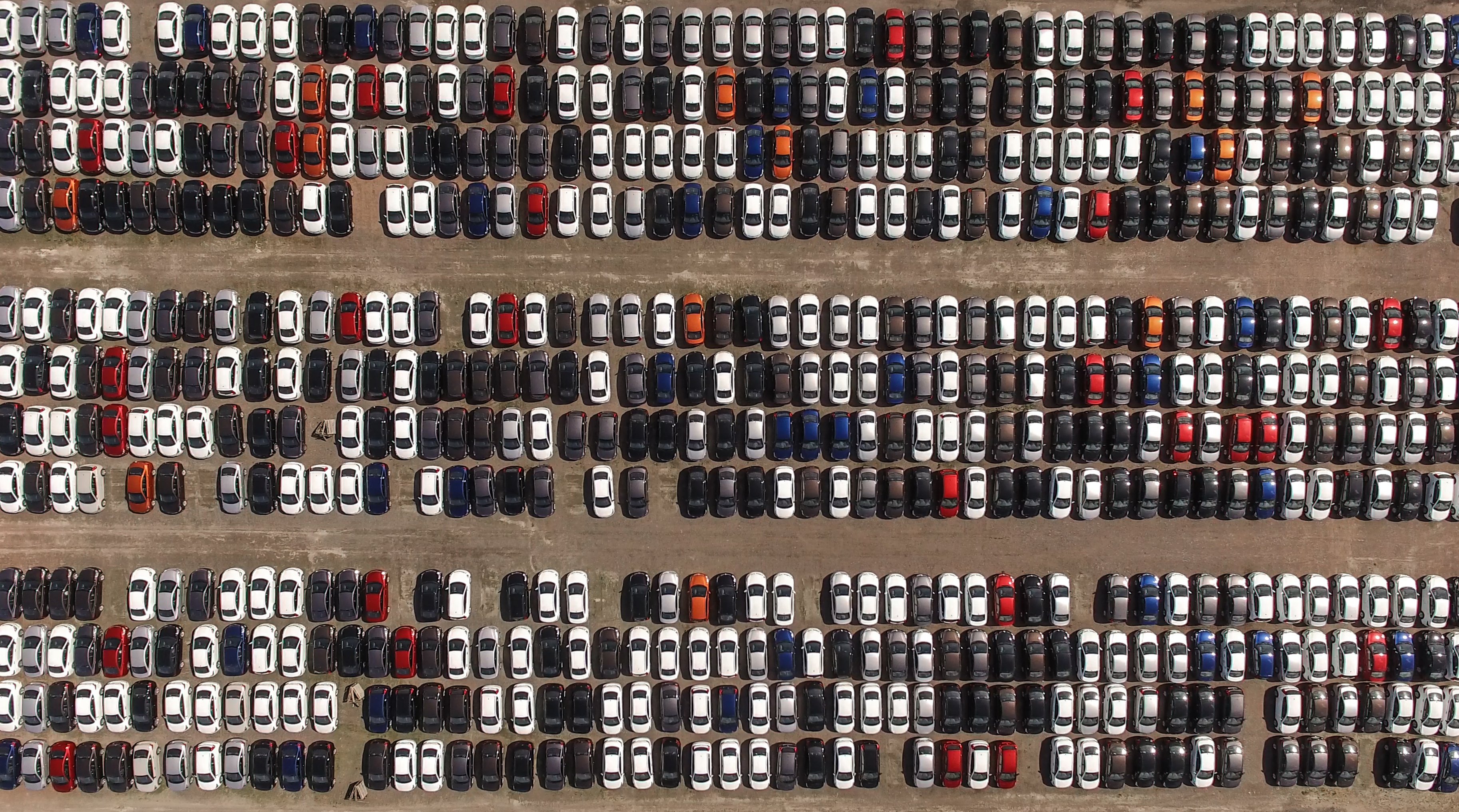 Cars in a parking lot.