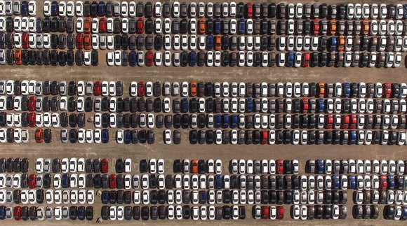 Cars in a parking lot.
