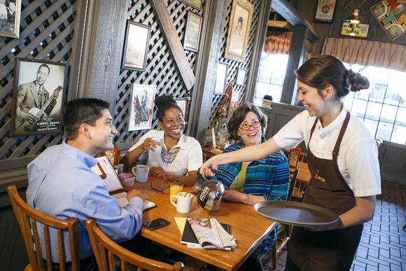 Diners at a table in Cracker Barrel.