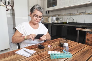 Person using blood sugar monitoring system
