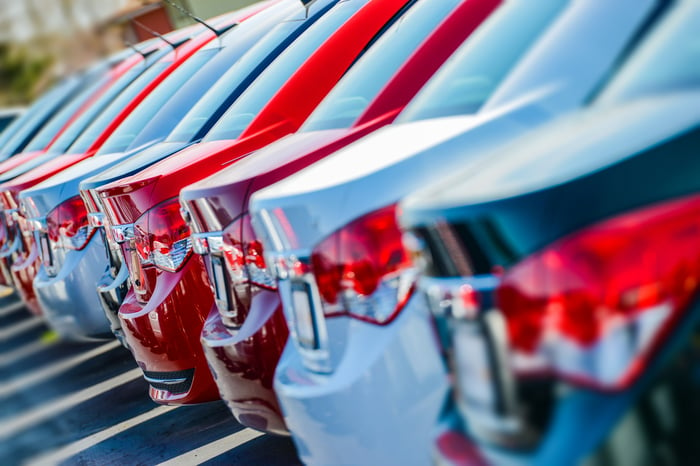 Cars in a parking lot.