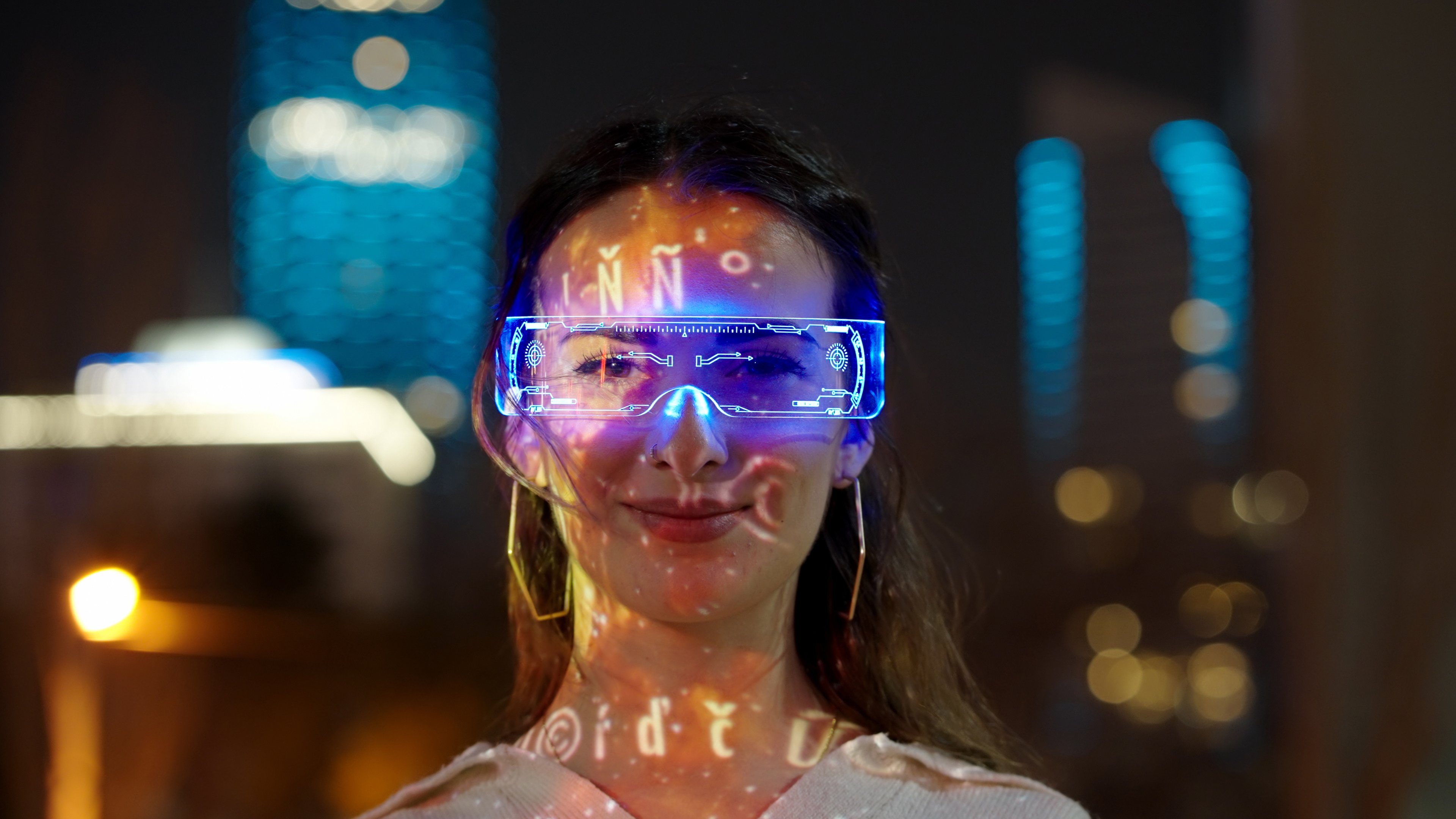 A person wears augmented reality glasses.