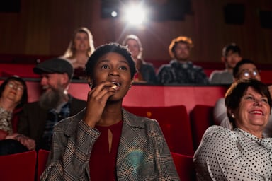 eating popcorn while watching movie