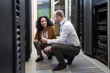 workers perform tasks at a data center