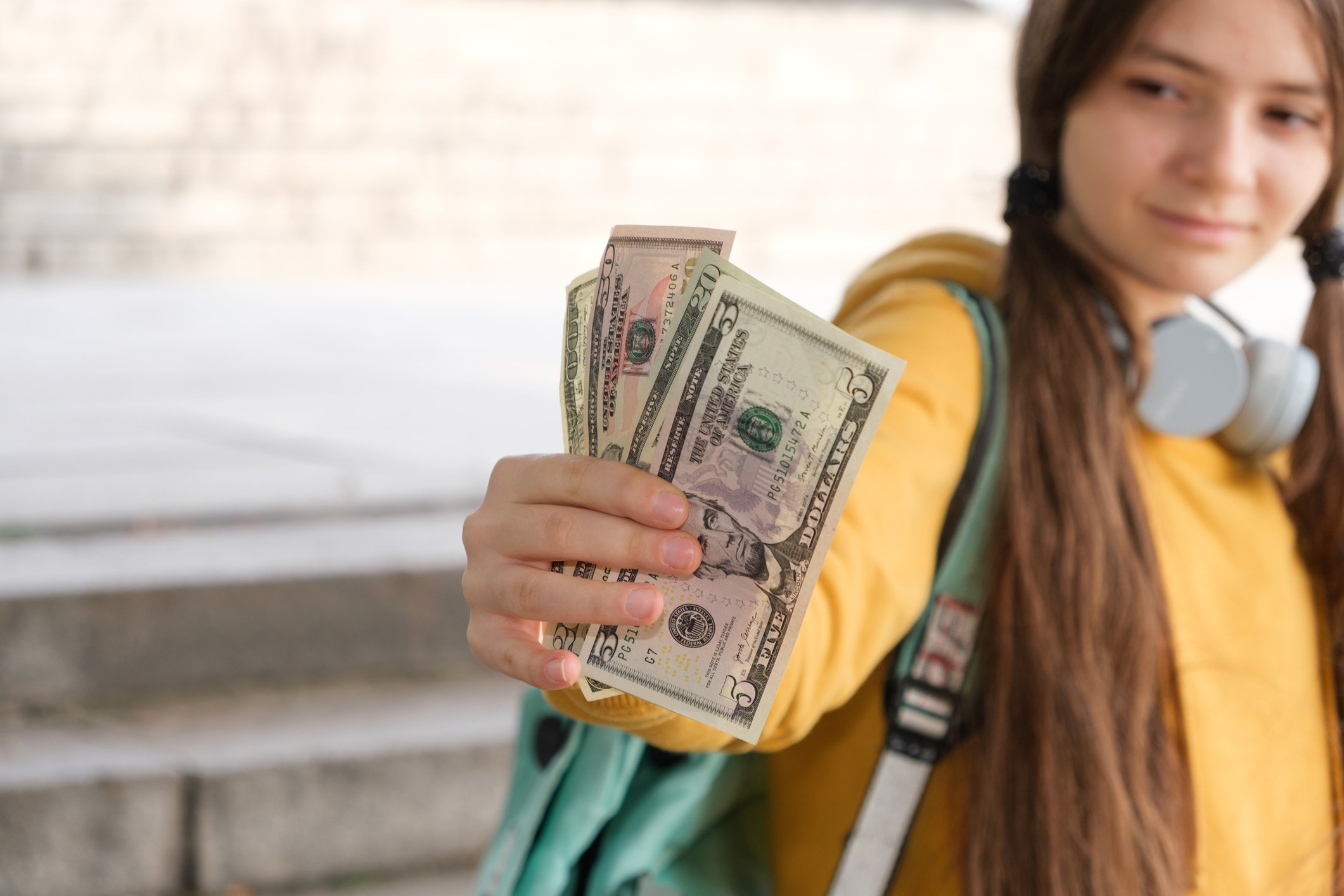invest-dollars-girl-money