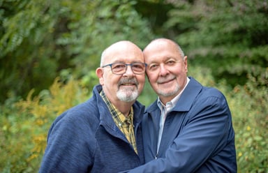 Getty - couple in blue outside smiling