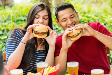 Couple Eating Hamburgers