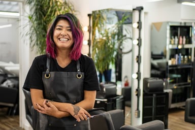 Getty - hair stylist smiling happy at work