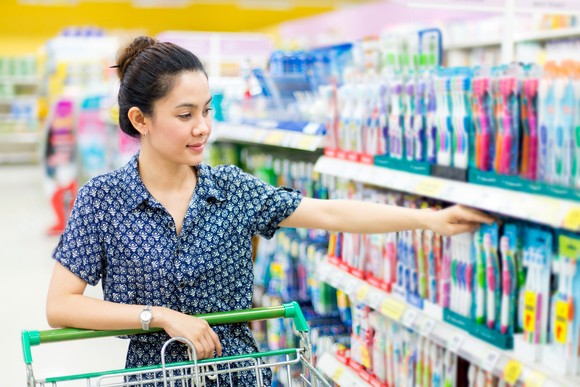 A person shops for consumer staples at a store.