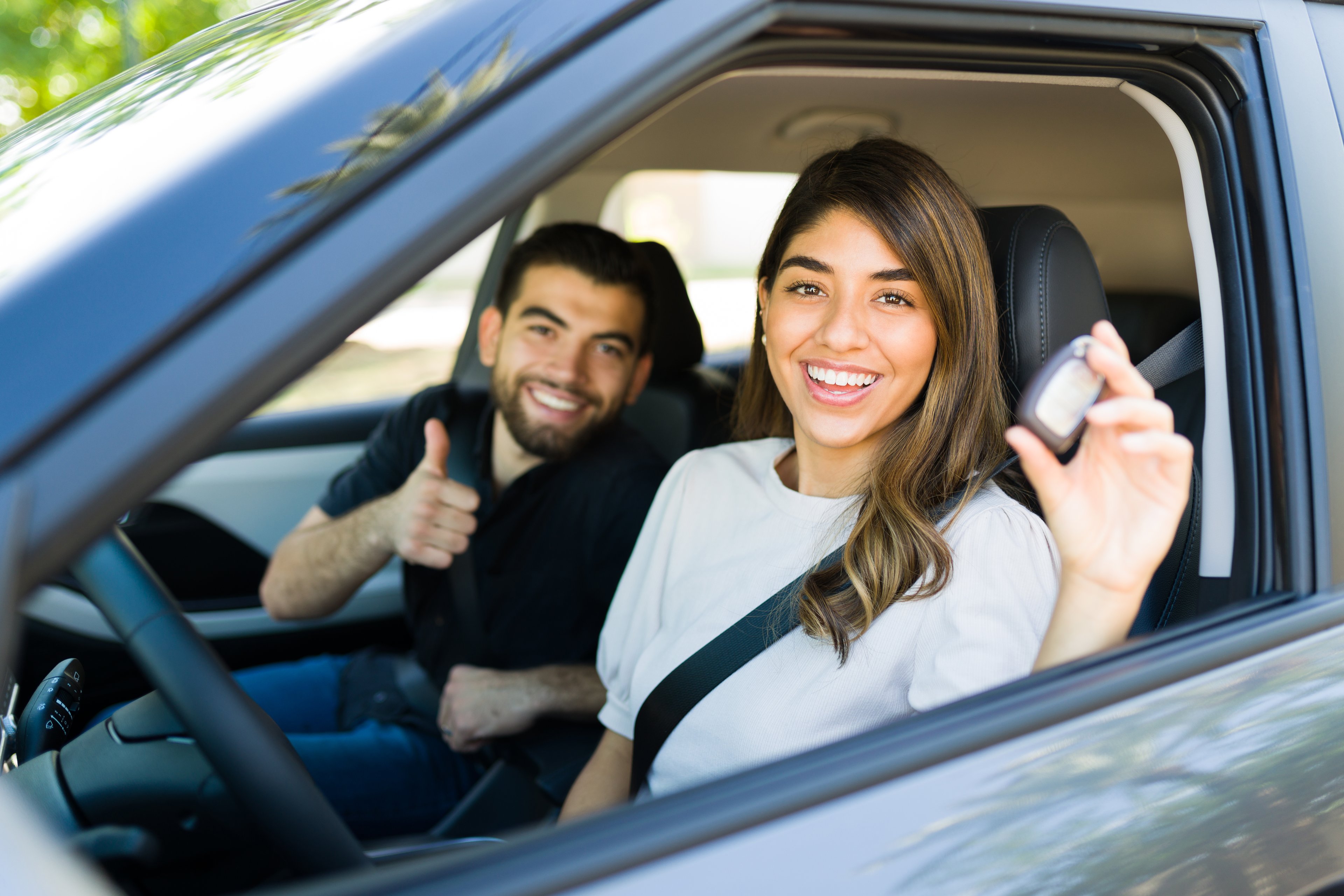 test driving car couple in car
