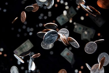 US coins falling through the air