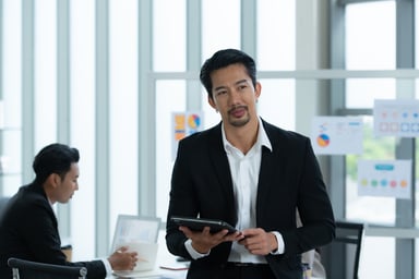 Investor-thinking-about-stock-charts-getty