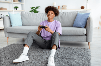 teenager playing video games