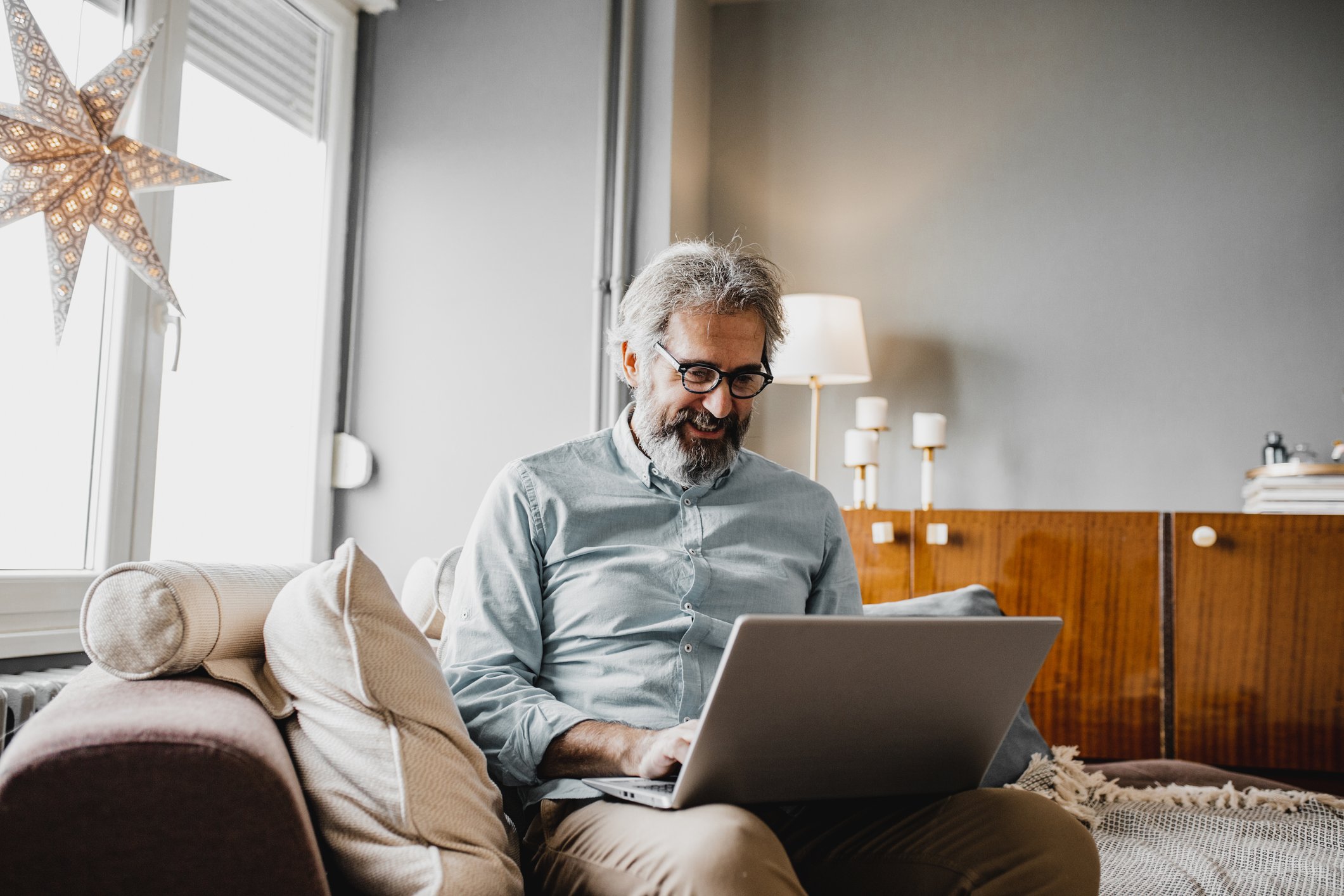 A person at a laptop.