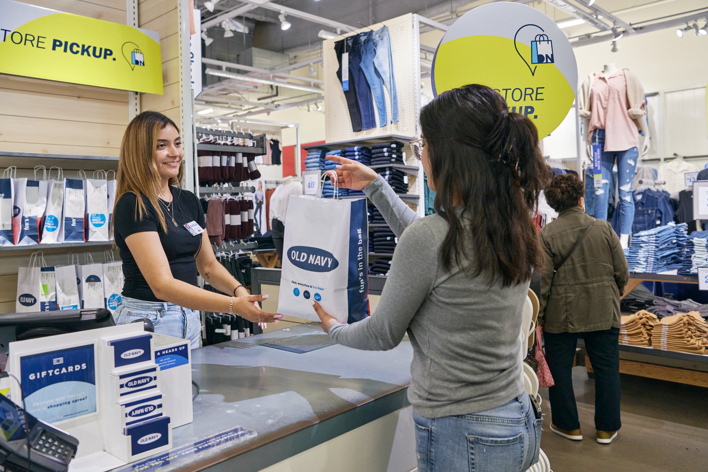 A person shops at Old Navy.