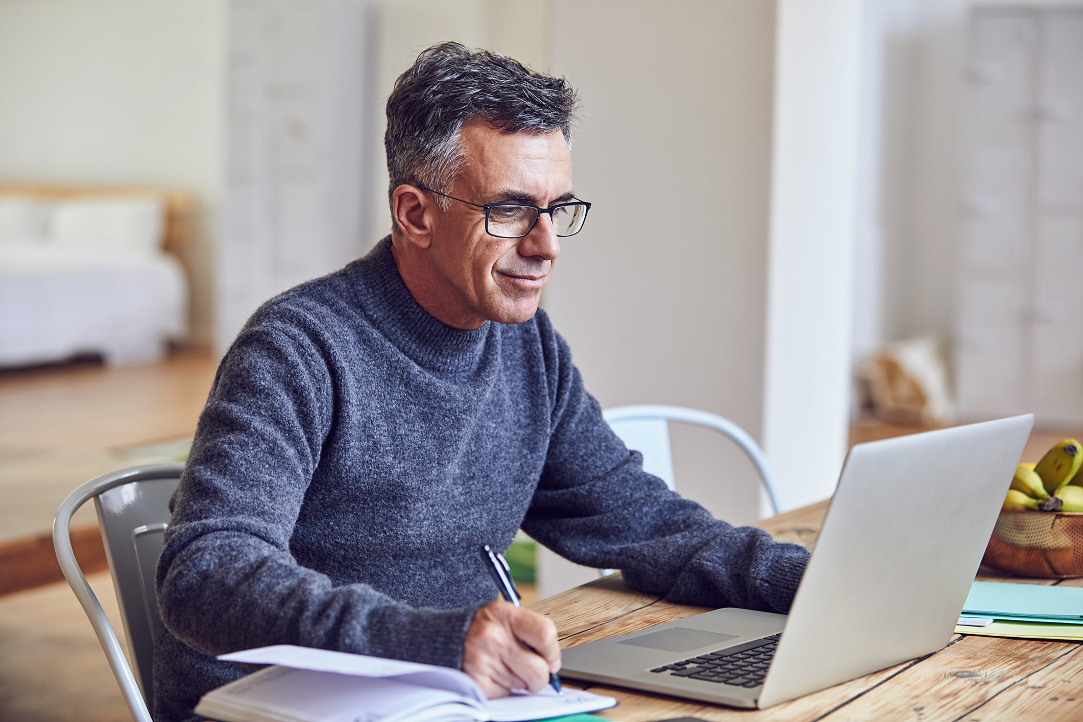 A person at a laptop.