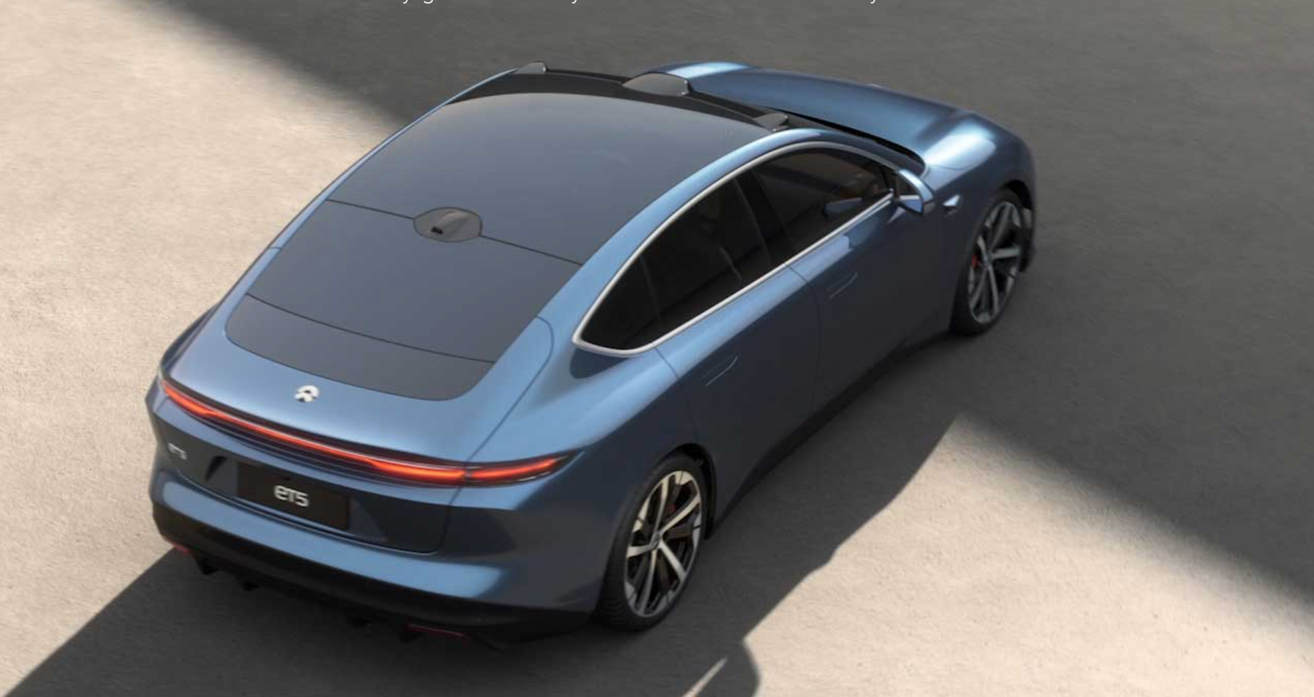 View of slate blue Nio ET5 from above. 