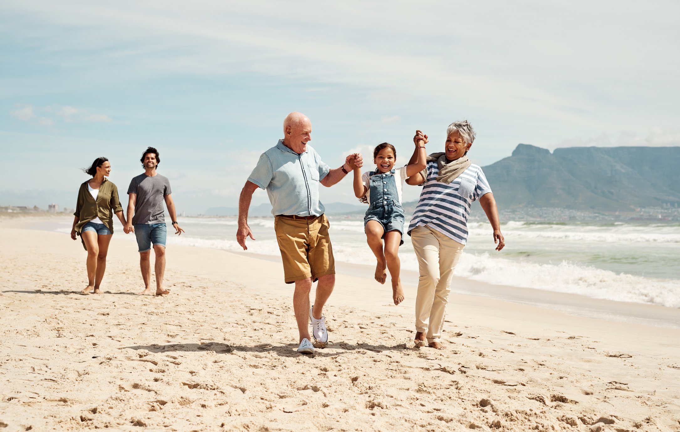grandparents family kids on the beach