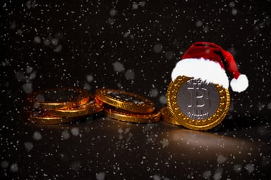 holiday bitcoin in santa hat snow