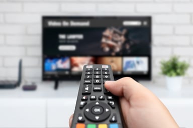 watching-tv-with-remote-control-in-hand
