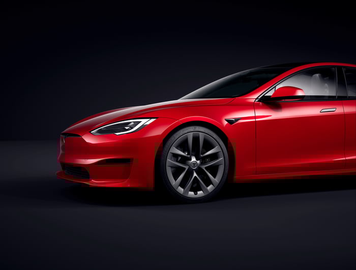 front end of red Tesla Model S. 