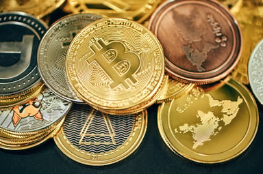 IRL Crypto Coins on Table
