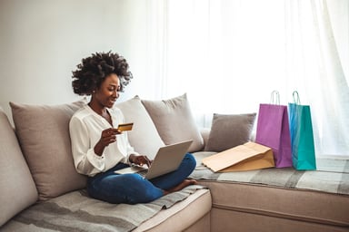 shopper at home on laptop buying online