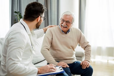 Patient talking with a physician.