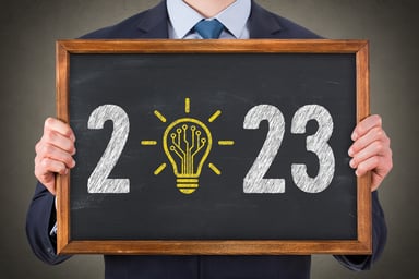 2023 person drawing with light bulb on chalkboard