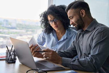 Couple looking at documents.
