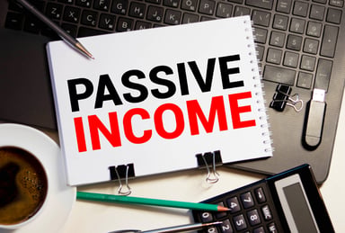 A pad with passive income written on it.