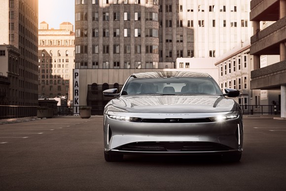 front view of Lucid Air sedan in city.