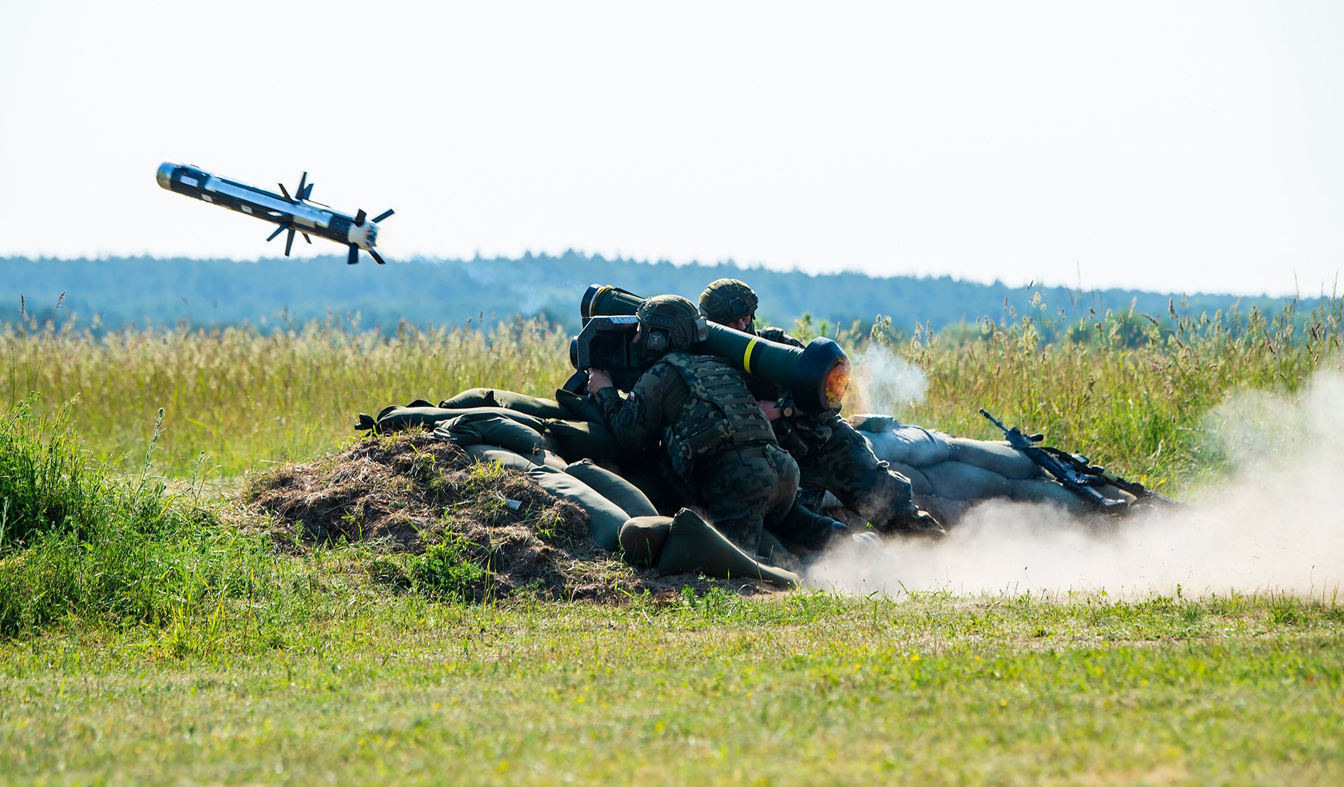 Soldiers launching Javelin missile.