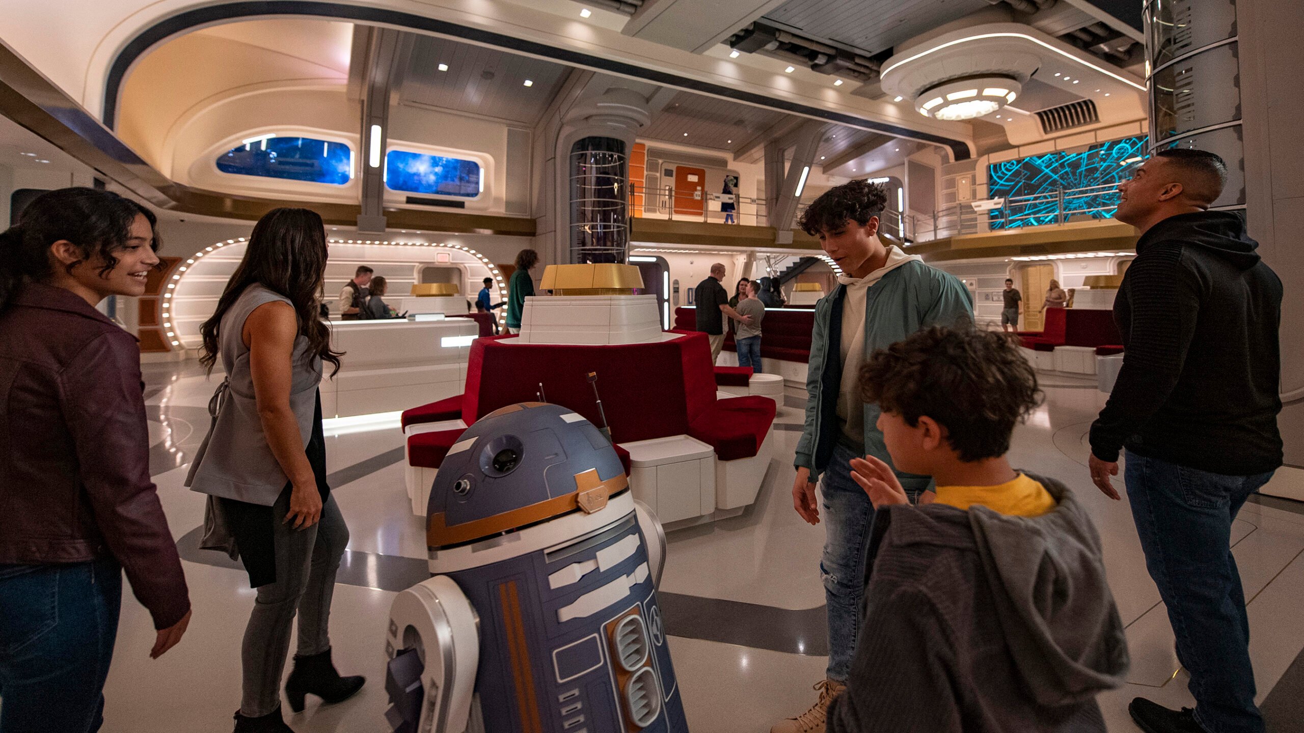 A family boarding the Star Wars: Galactic Starcruiser experience.