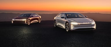 Lucid Air sedans at sunset